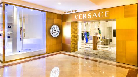 versace business profitability